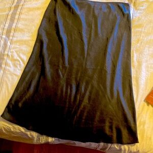 Chelsea 28 skirt. Elastic waist. Silky feel although 100% polyester.